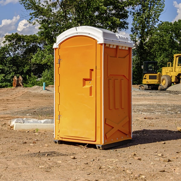 what is the cost difference between standard and deluxe portable restroom rentals in Brookeland